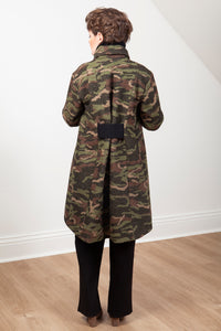 Woman wearing the Grace coat in camo wool - back view