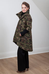 Woman wearing the Grace coat in camo wool - side view