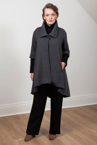 Woman wearing the Grace coat in grey wool - front view